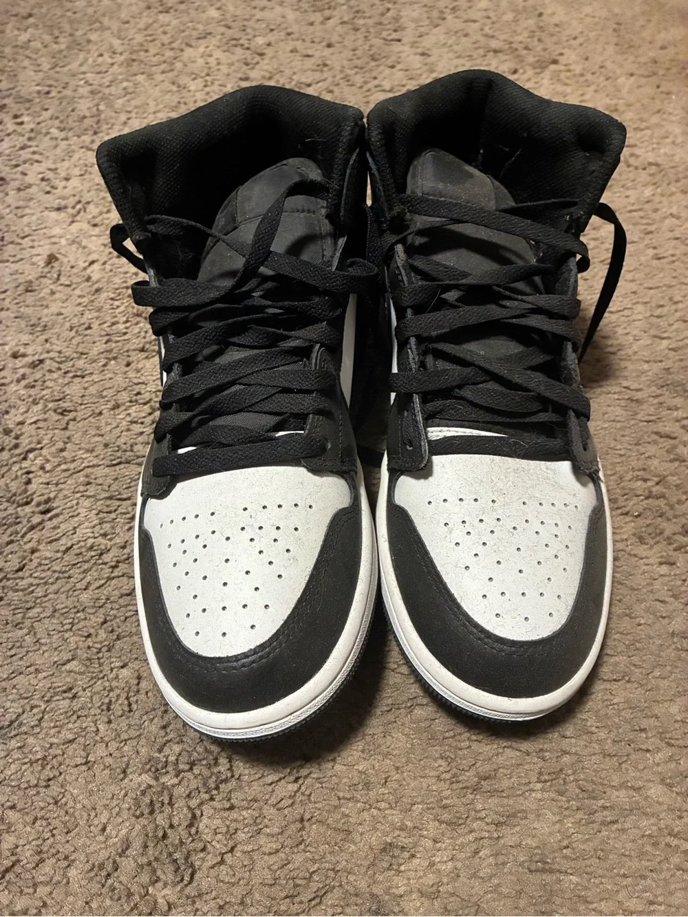 Jordan Black and White High-Top Sneakers
